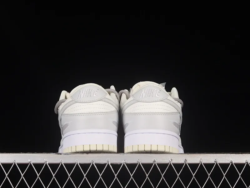 All Categories Nk SB Dunk Series Nk SB Dunk Low Low-top Sneakers Nk Dunk Low Retro "Coconut Milk" Vibe Wind Distressed Paper Plane Travel Graffiti Customized Deconstructed Strap Casual Sneakers DJ6188-100